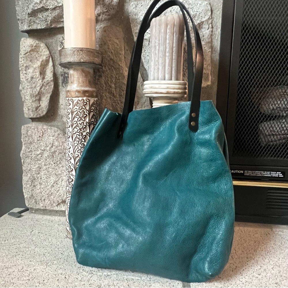 Hawks and Doves rustic leather tote